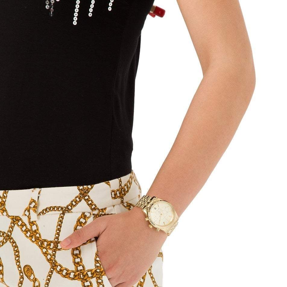 Michael Kors Lexington Chronograph Champagne Dial Ladies Watch MK5556 Water resistance: 100 meters / 330 feet Movement: Quartz